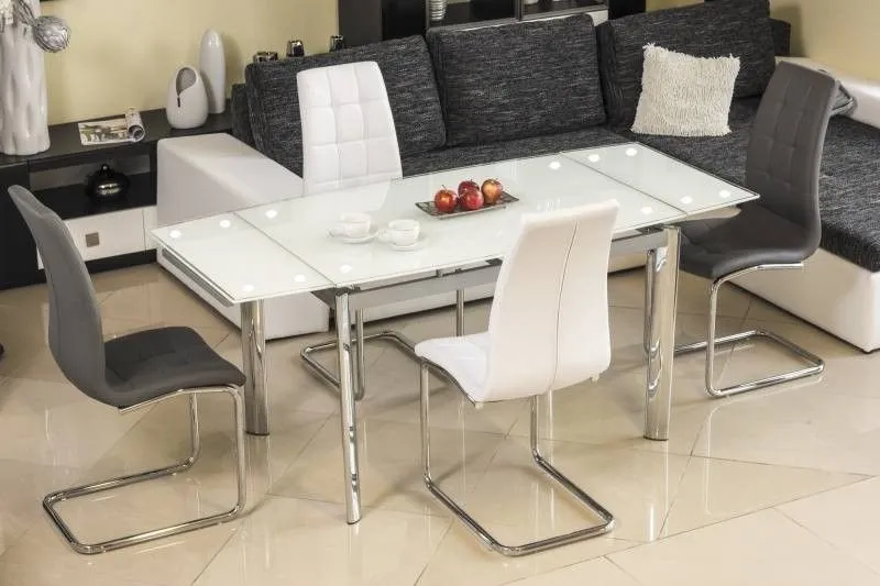 Wartość stołów białych rozkładanych w przestrzeniach domowych